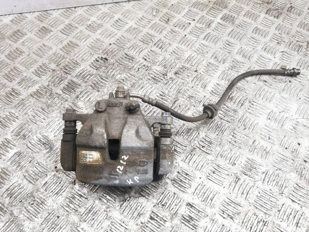 Front brake caliper – left