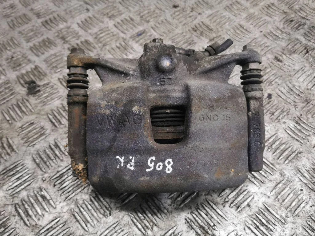 Front brake caliper – left