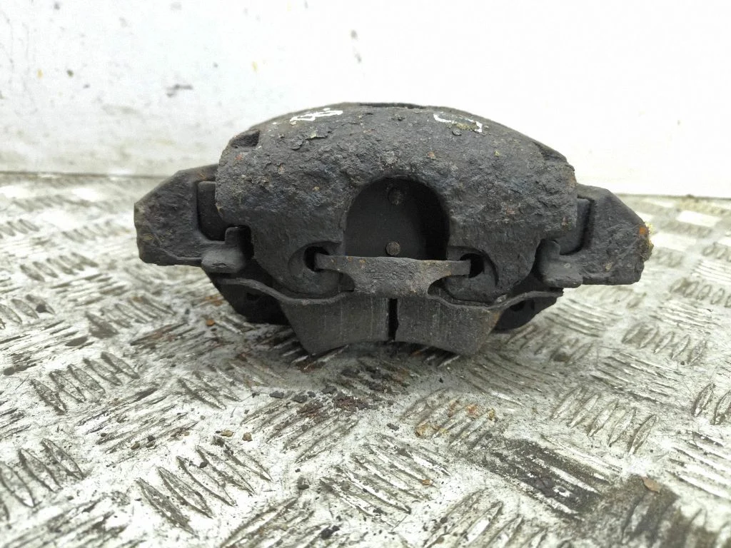Front brake caliper – right