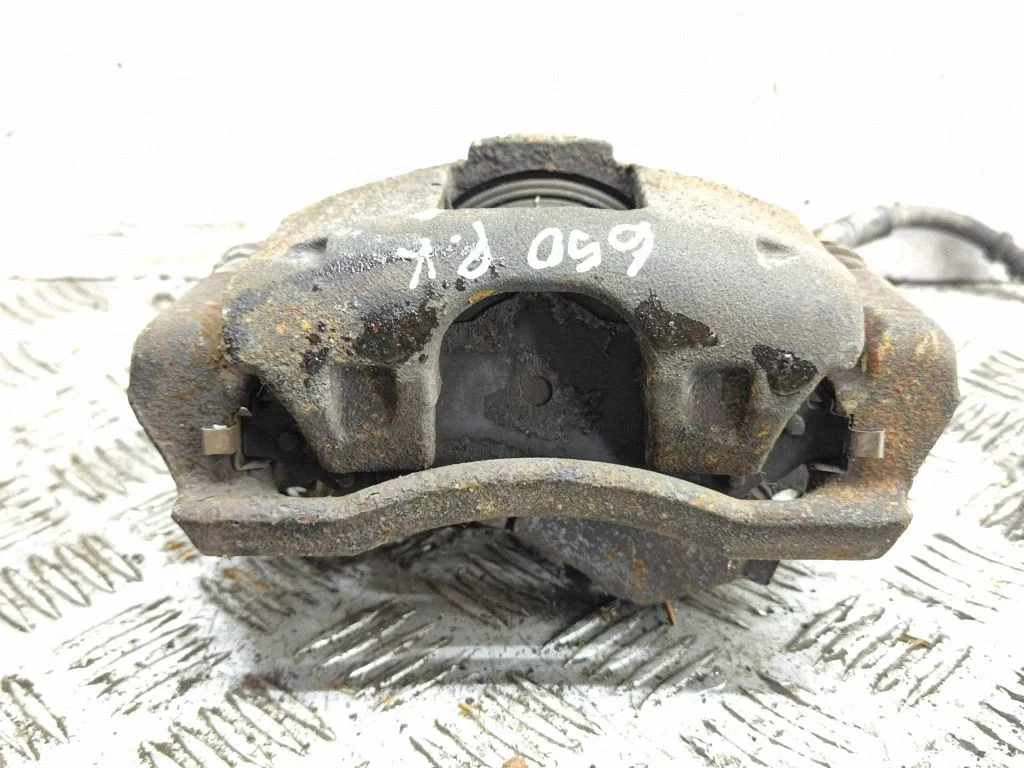 Front brake caliper – left