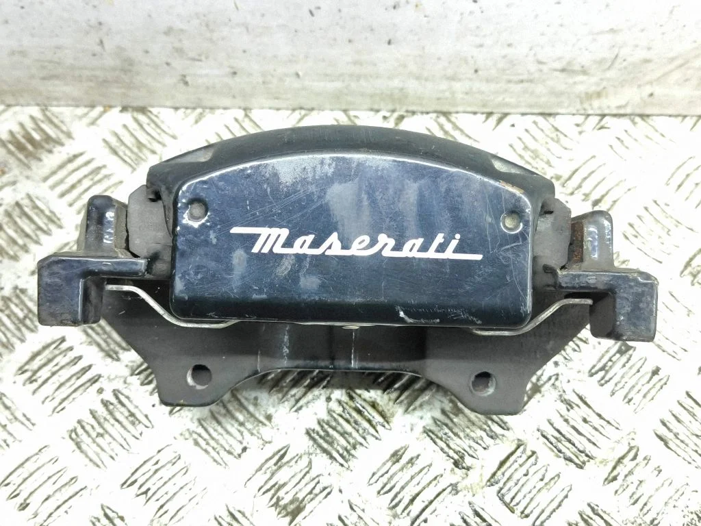 Front brake caliper – left