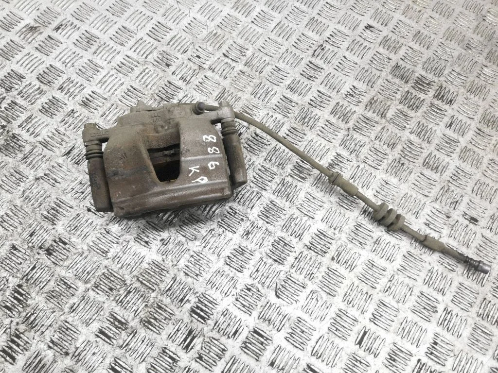 Front brake caliper – left