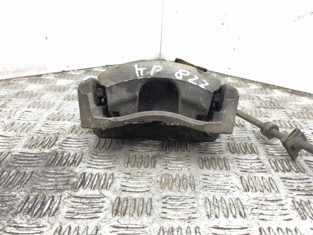 Front brake caliper – left