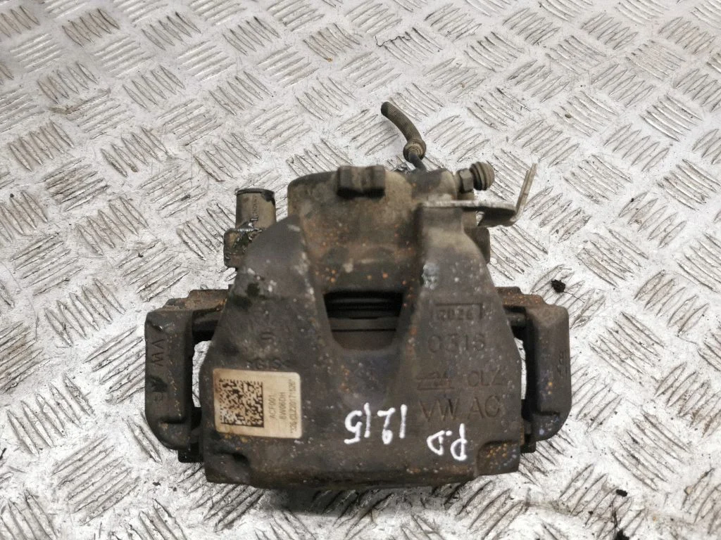 Front brake caliper – right