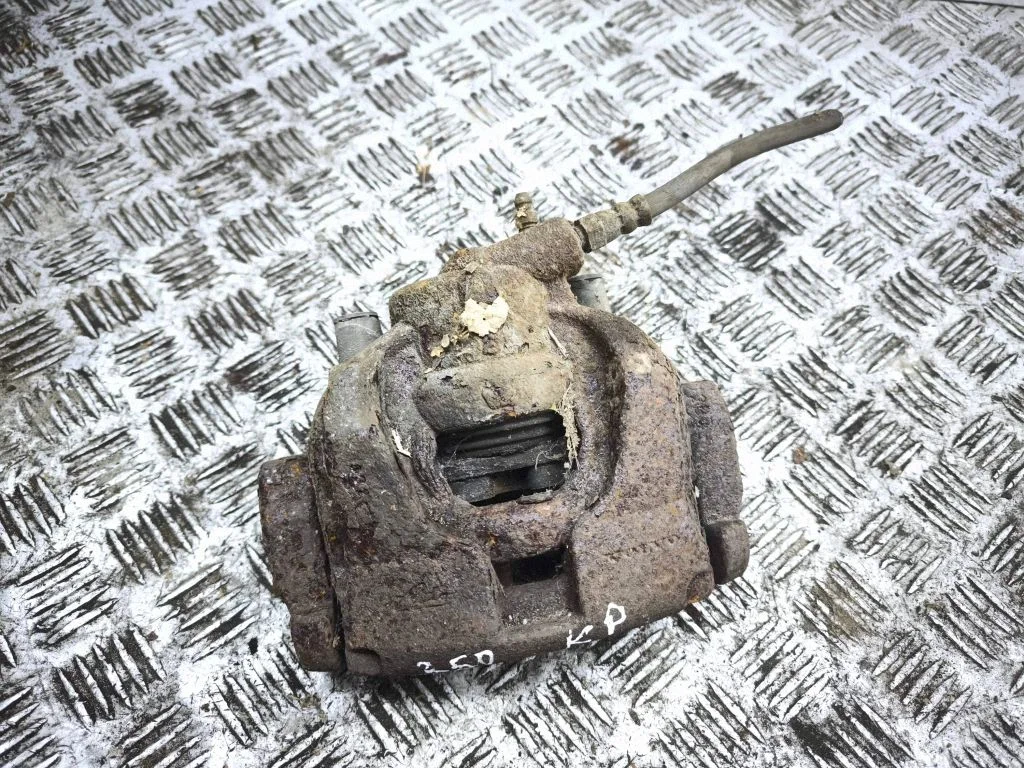 Front brake caliper – left