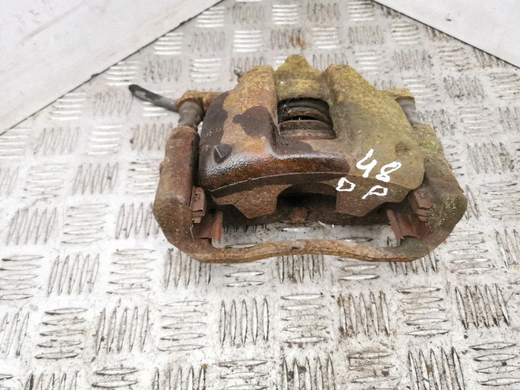 Front brake caliper – right