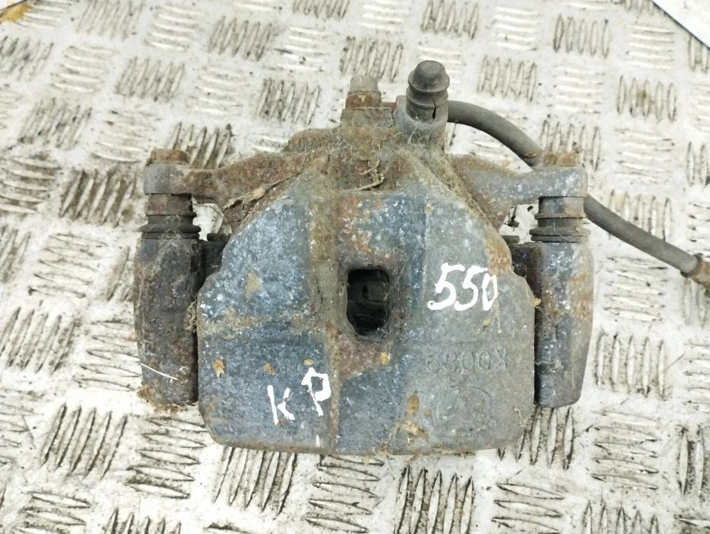 Front brake caliper – left