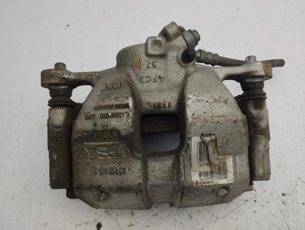 Front brake caliper – left