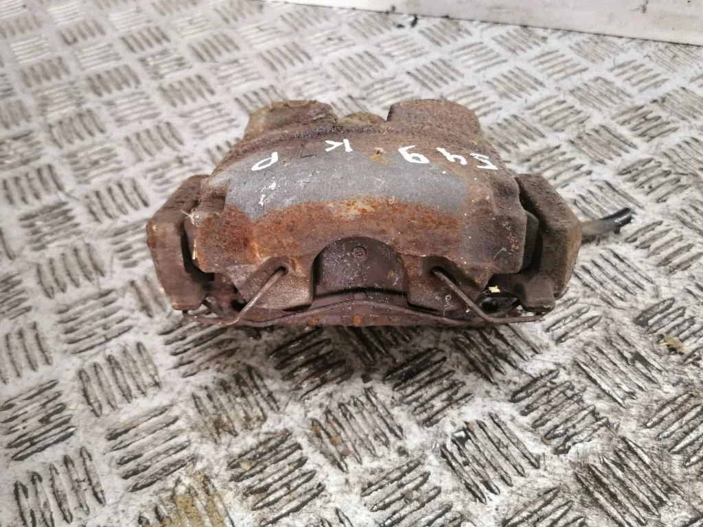 Front brake caliper – left