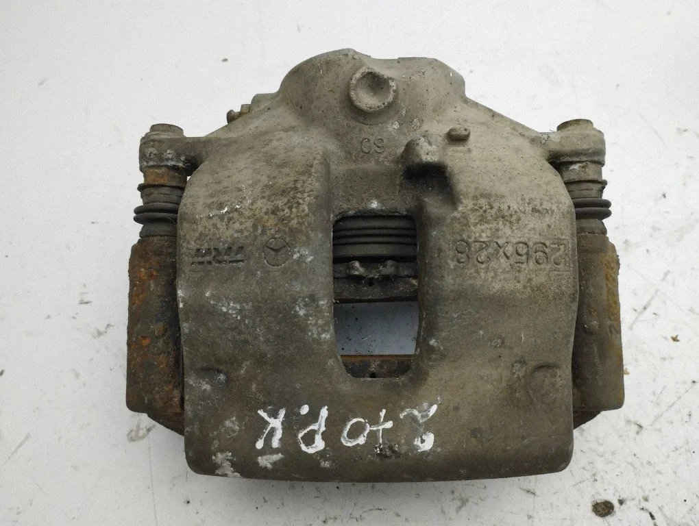 Front brake caliper – left