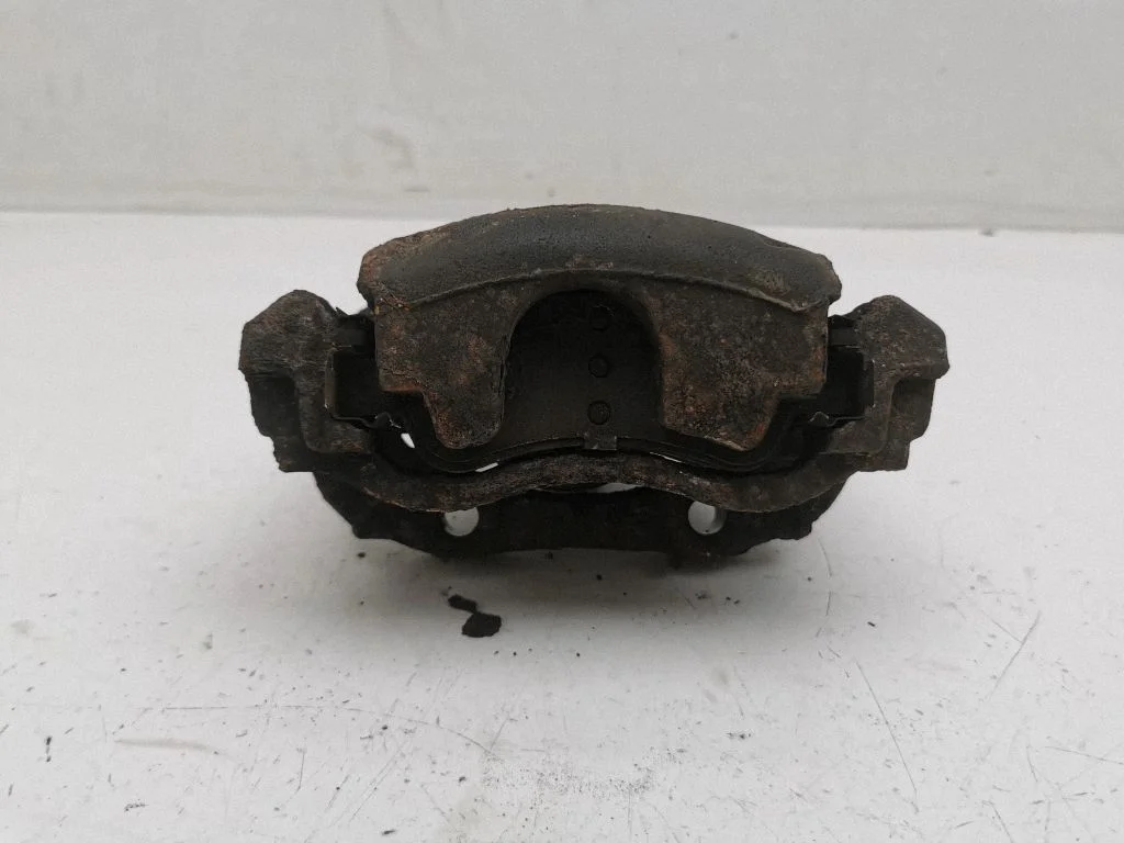 Front brake caliper – left