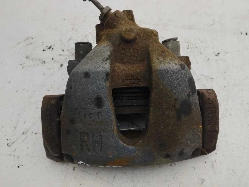 Front brake caliper – right