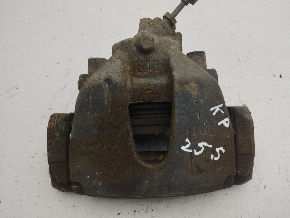 Front brake caliper – left