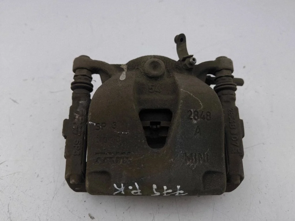Front brake caliper – left