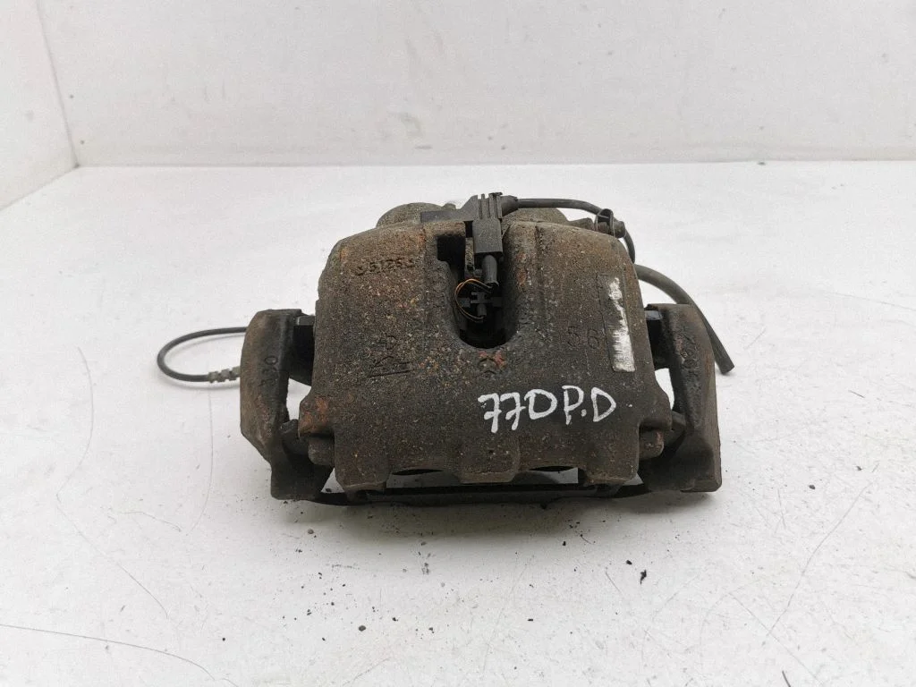 Front brake caliper – right