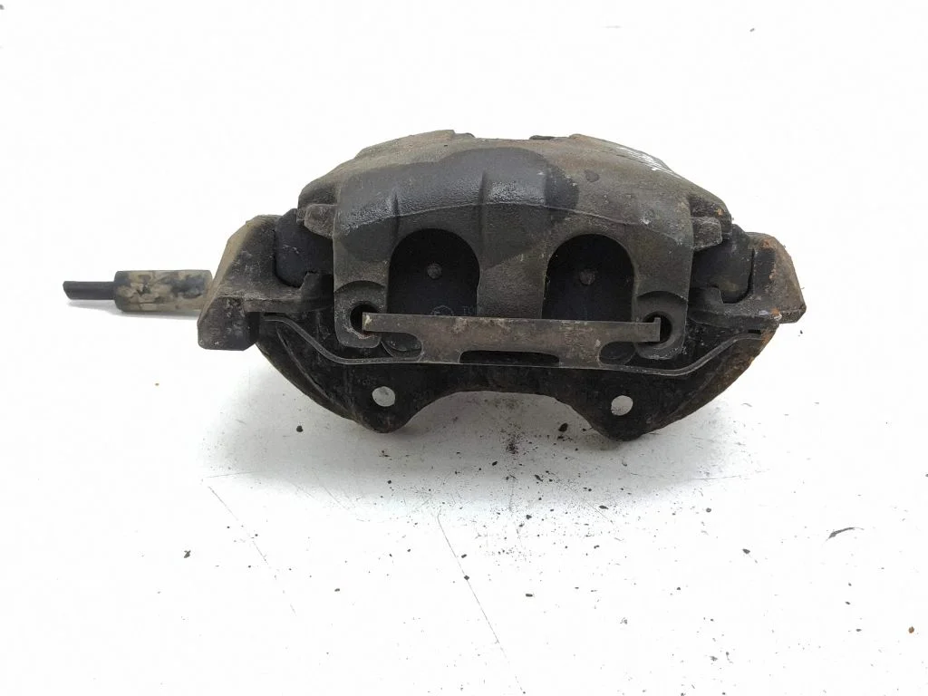 Front brake caliper – left