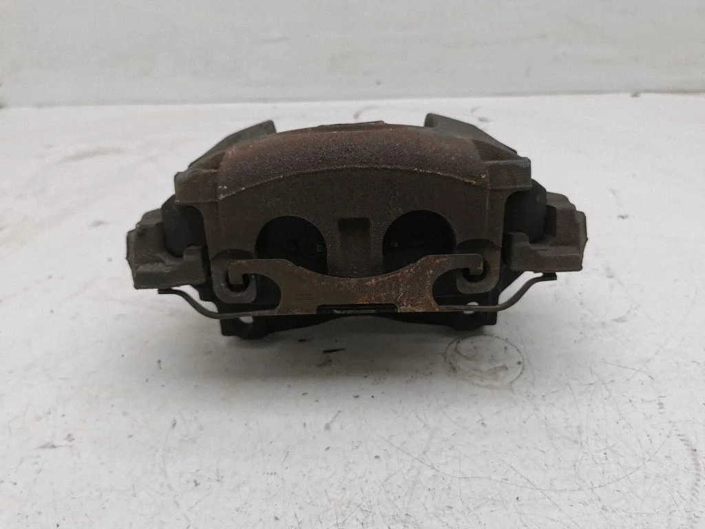 Front brake caliper – left