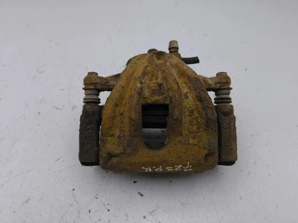 Front brake caliper – left