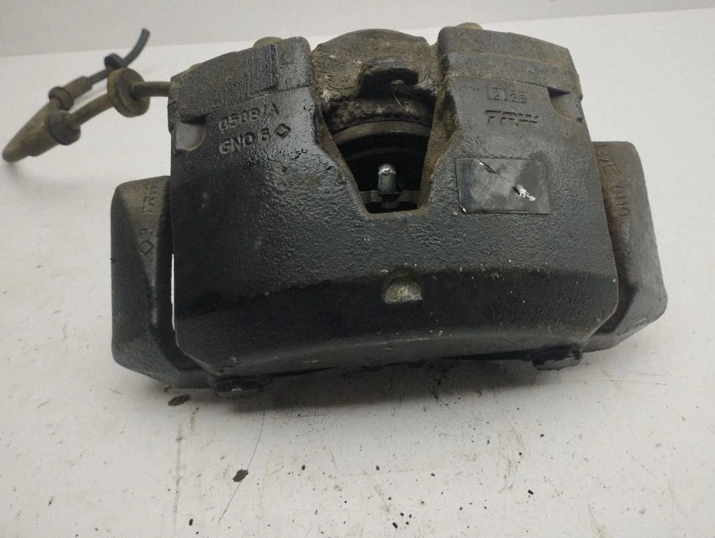 Front brake caliper – left