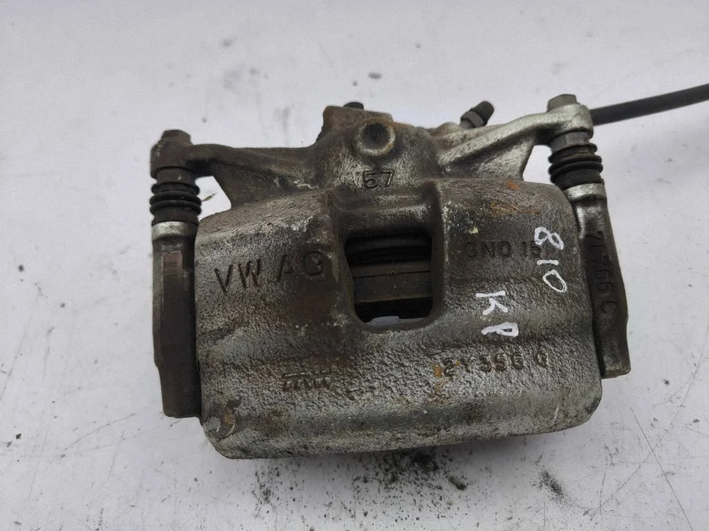 Front brake caliper – left