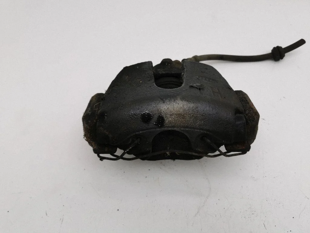 Front brake caliper – left