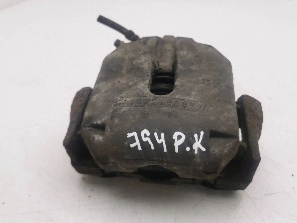 Front brake caliper – left