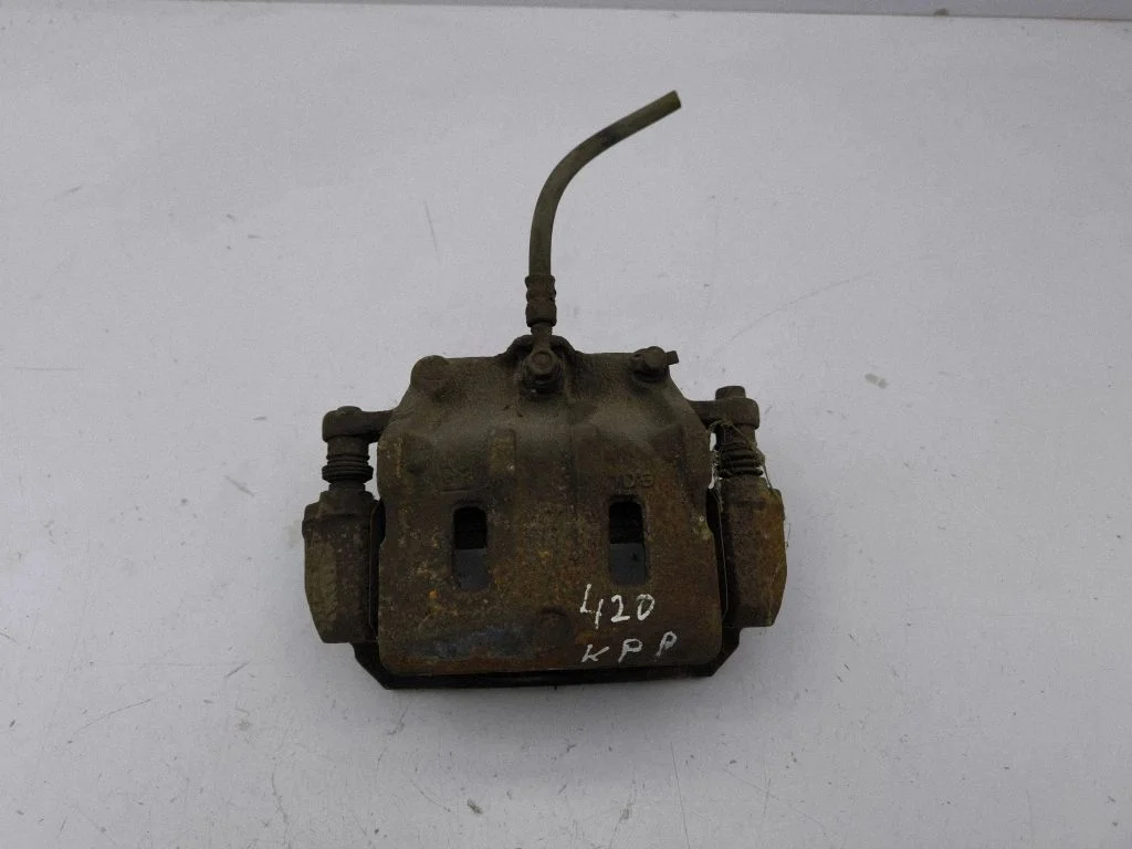 Front brake caliper – left