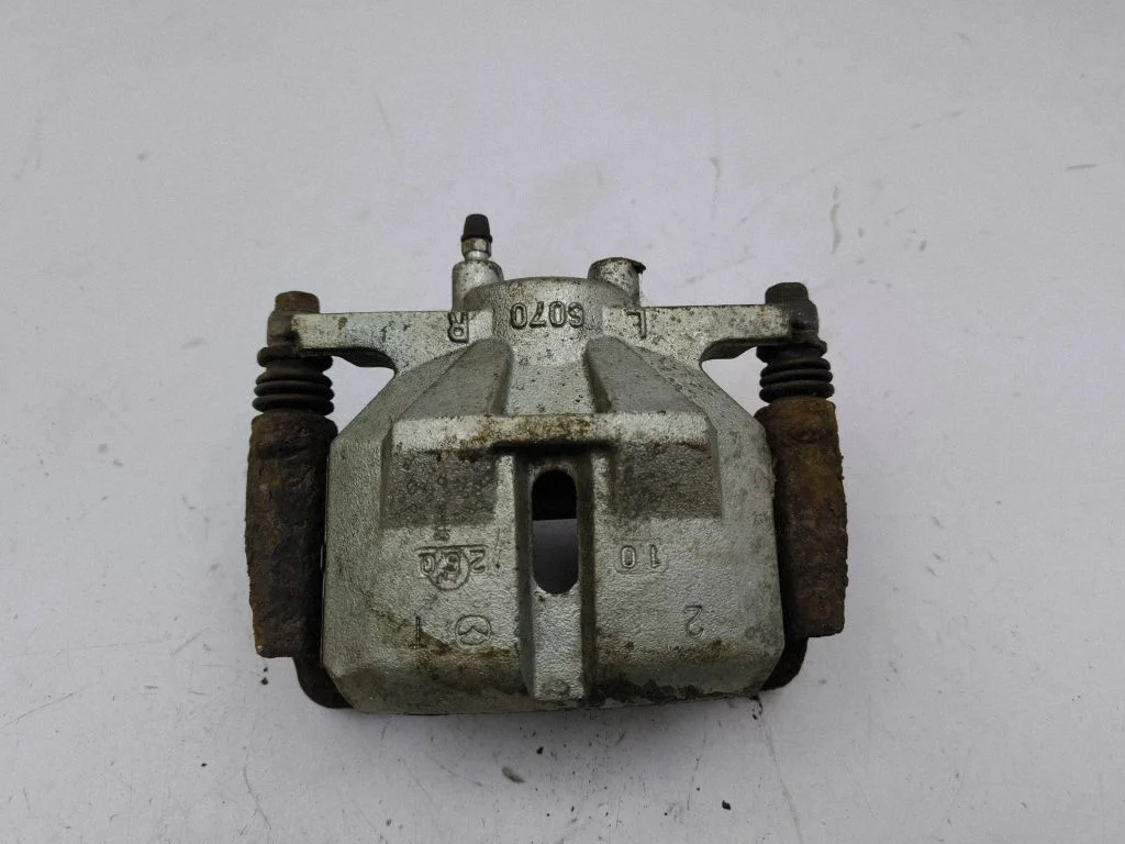 Front brake caliper – right