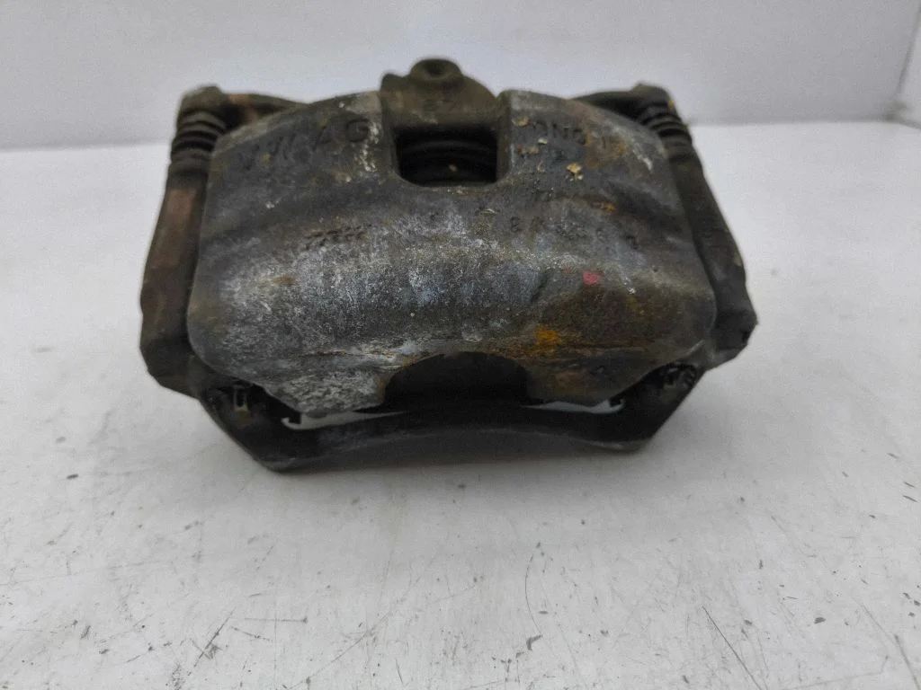 Front brake caliper – left