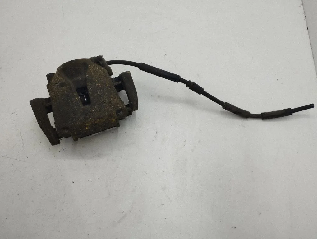 Front brake caliper 7509288