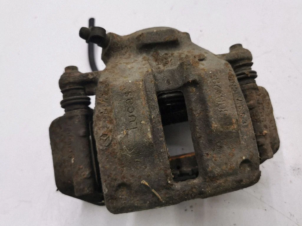 Front brake caliper – left