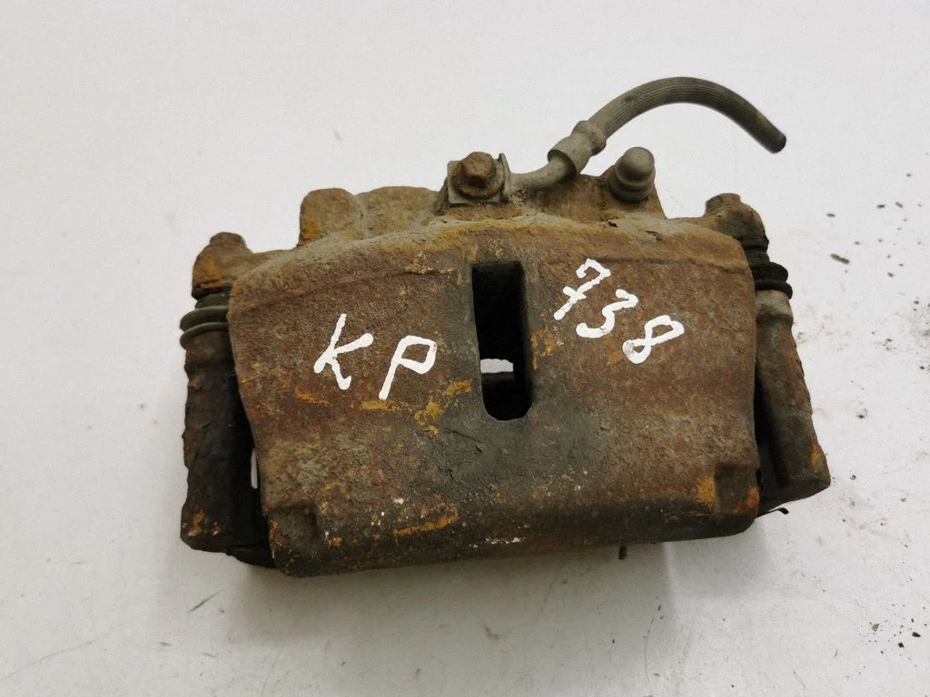 Front brake caliper – left