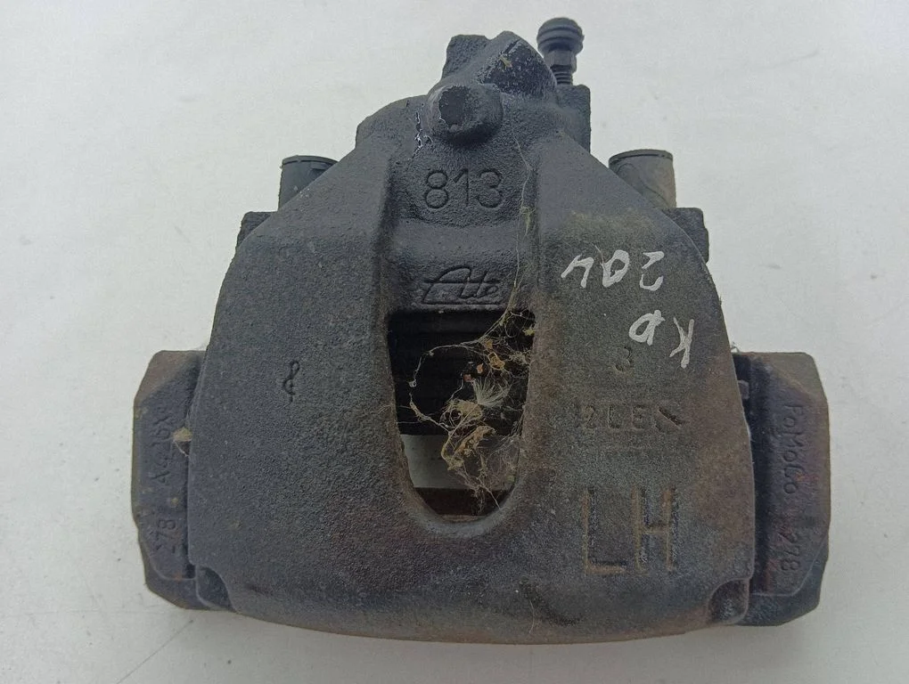 Front brake caliper – left