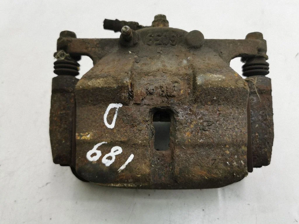 Front brake caliper – right