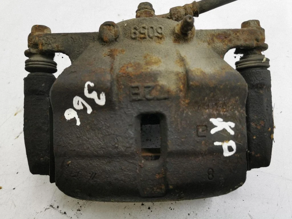 Front brake caliper – left