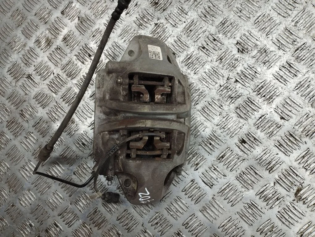 Front brake caliper 80A615105AB