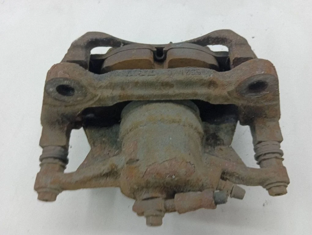 Front brake caliper – left