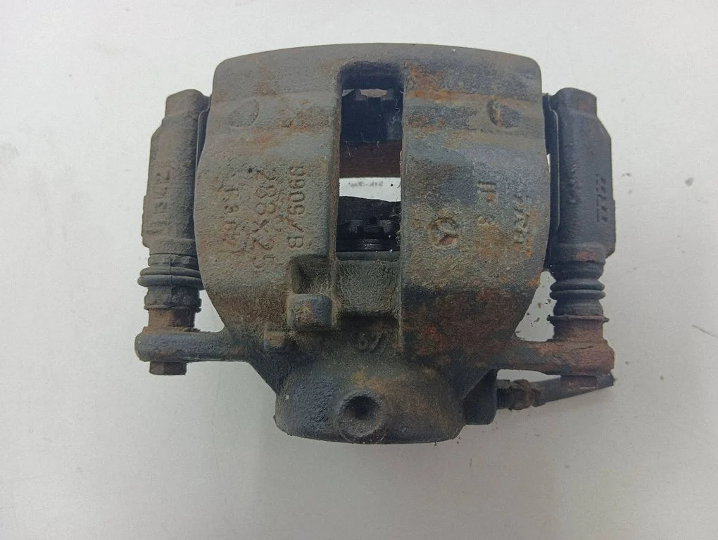 Front brake caliper – left