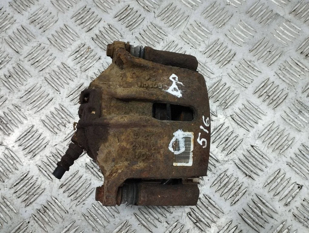 Front brake caliper – right