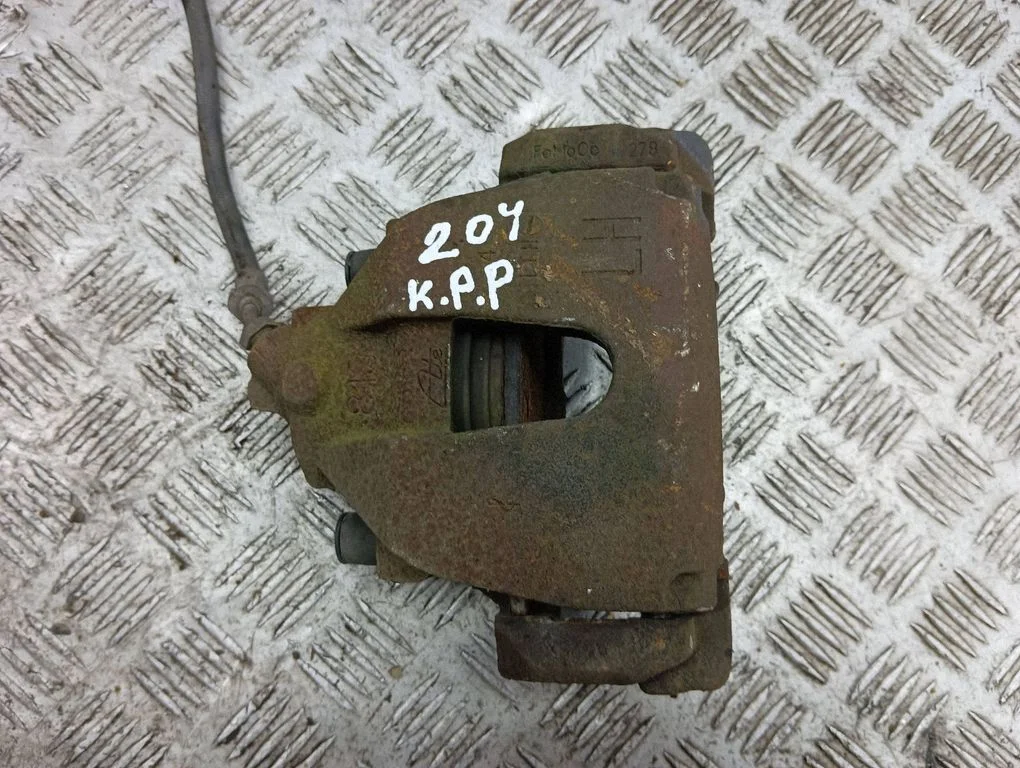 Front brake caliper – left