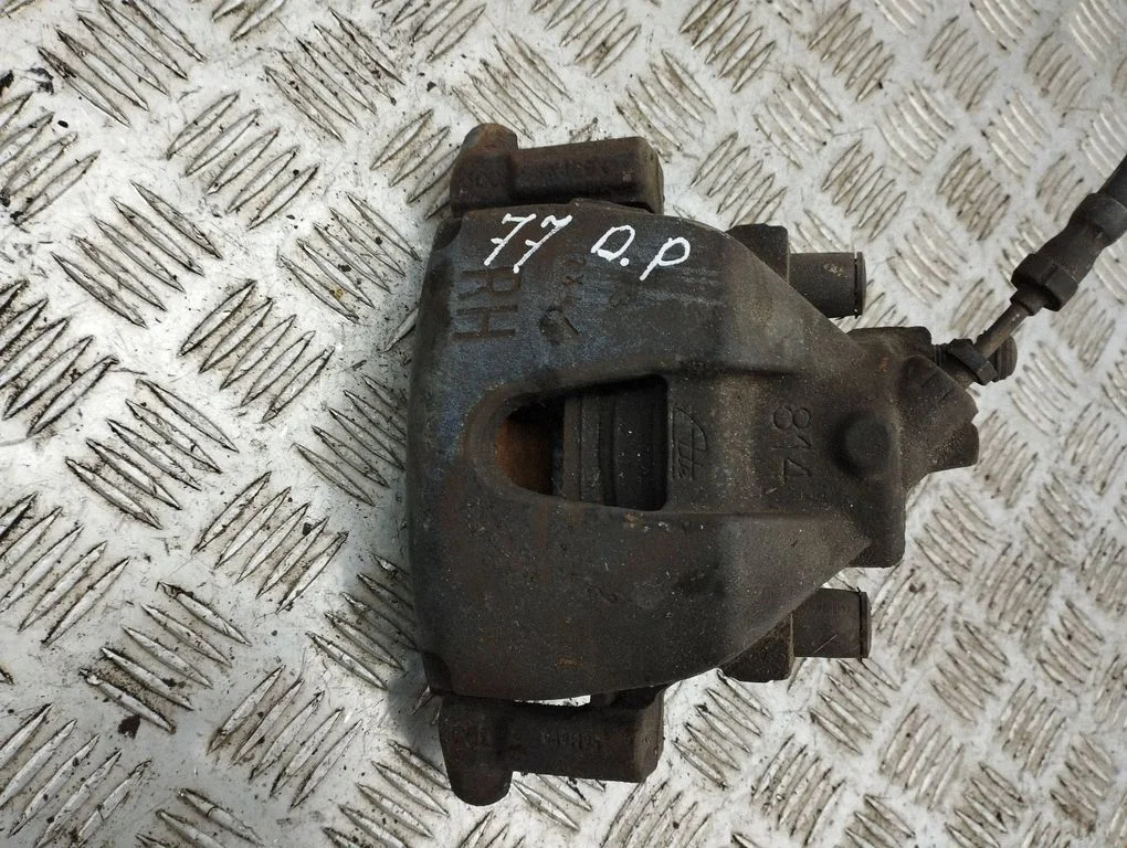 Front brake caliper – right