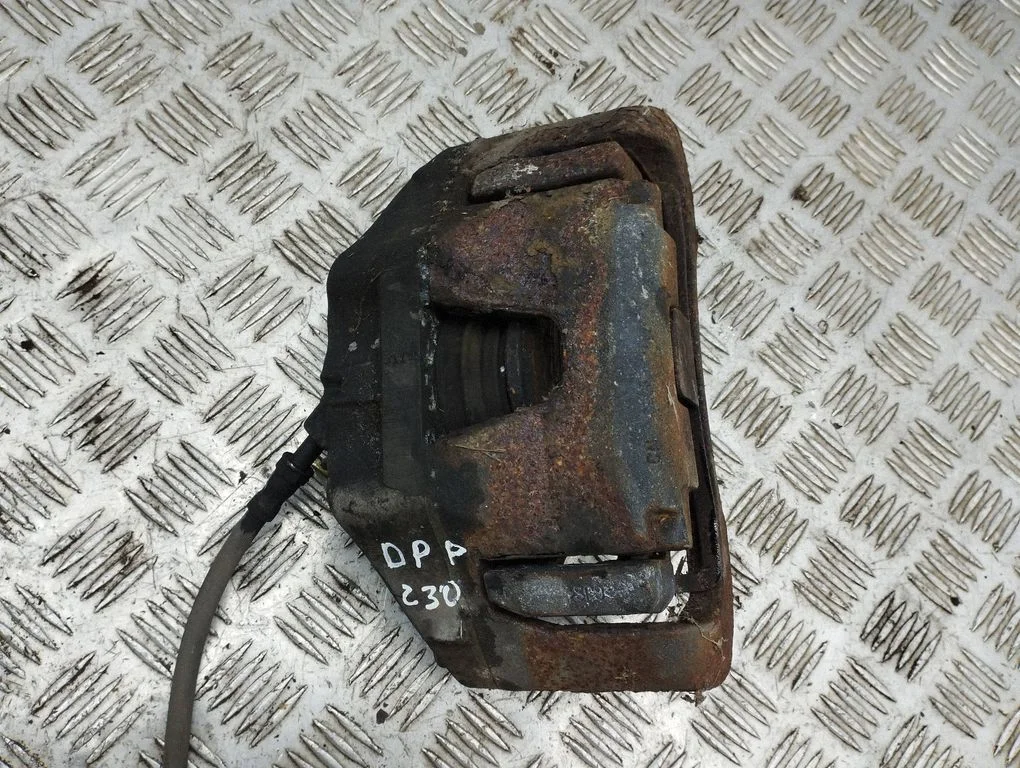 Front brake caliper – right