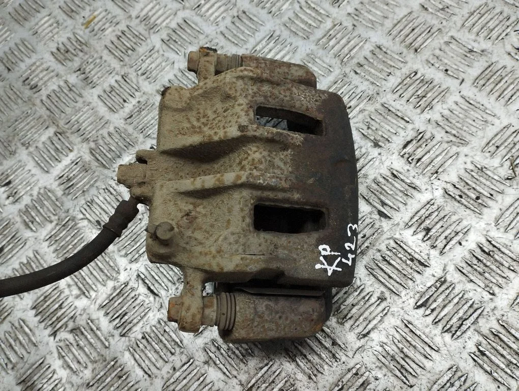 Front brake caliper – left