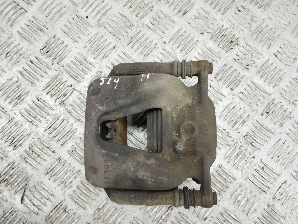 Front brake caliper – left