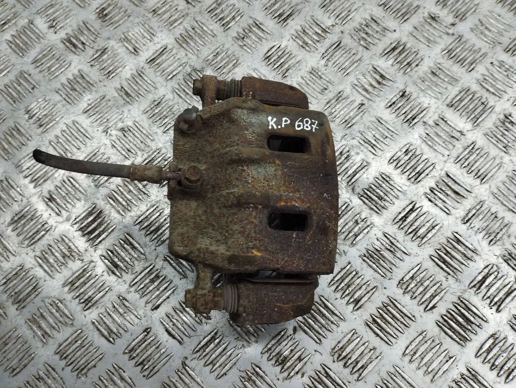 Front brake caliper – left