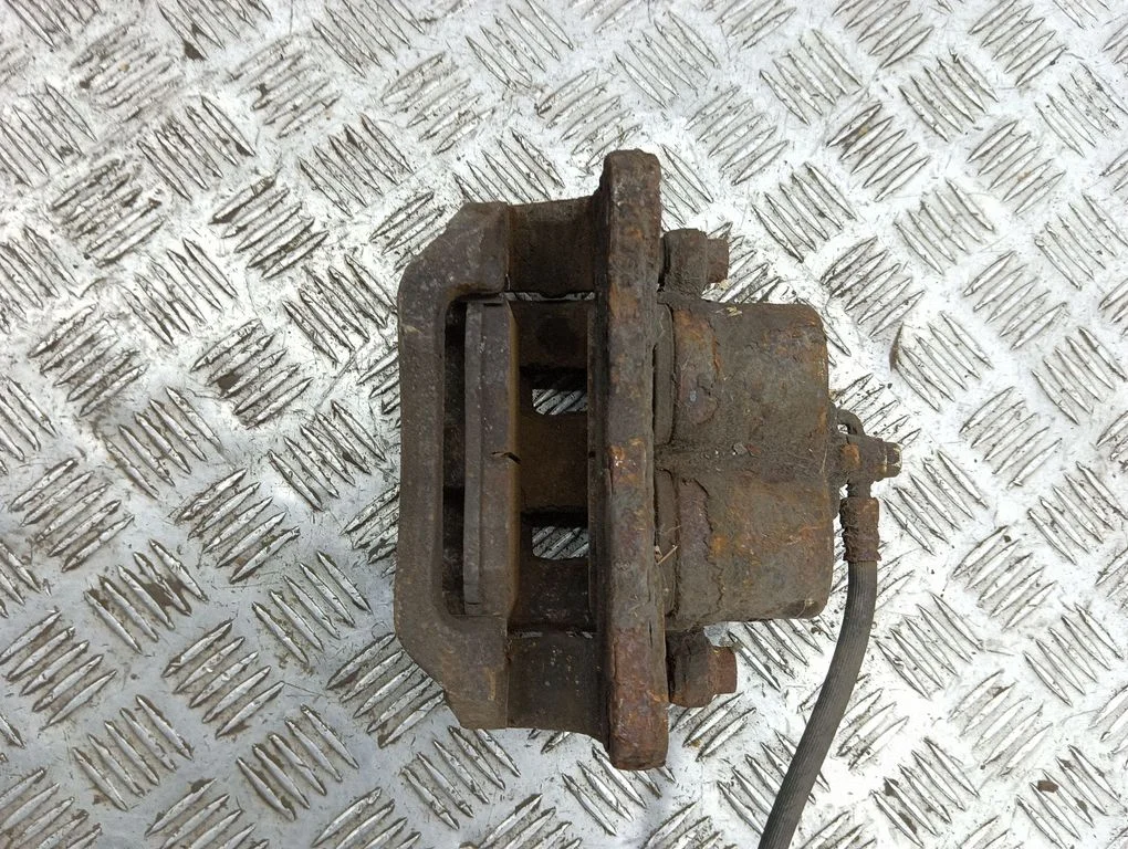 Front brake caliper – right