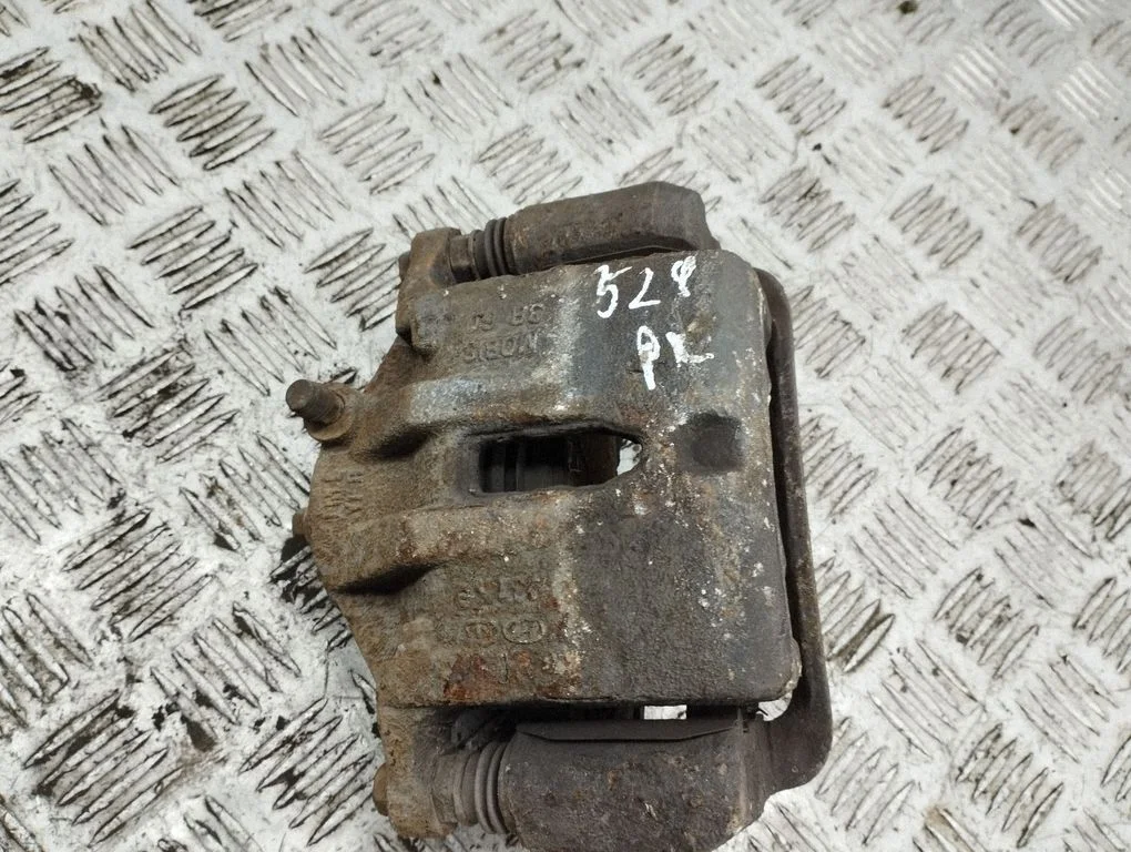 Front brake caliper – front left