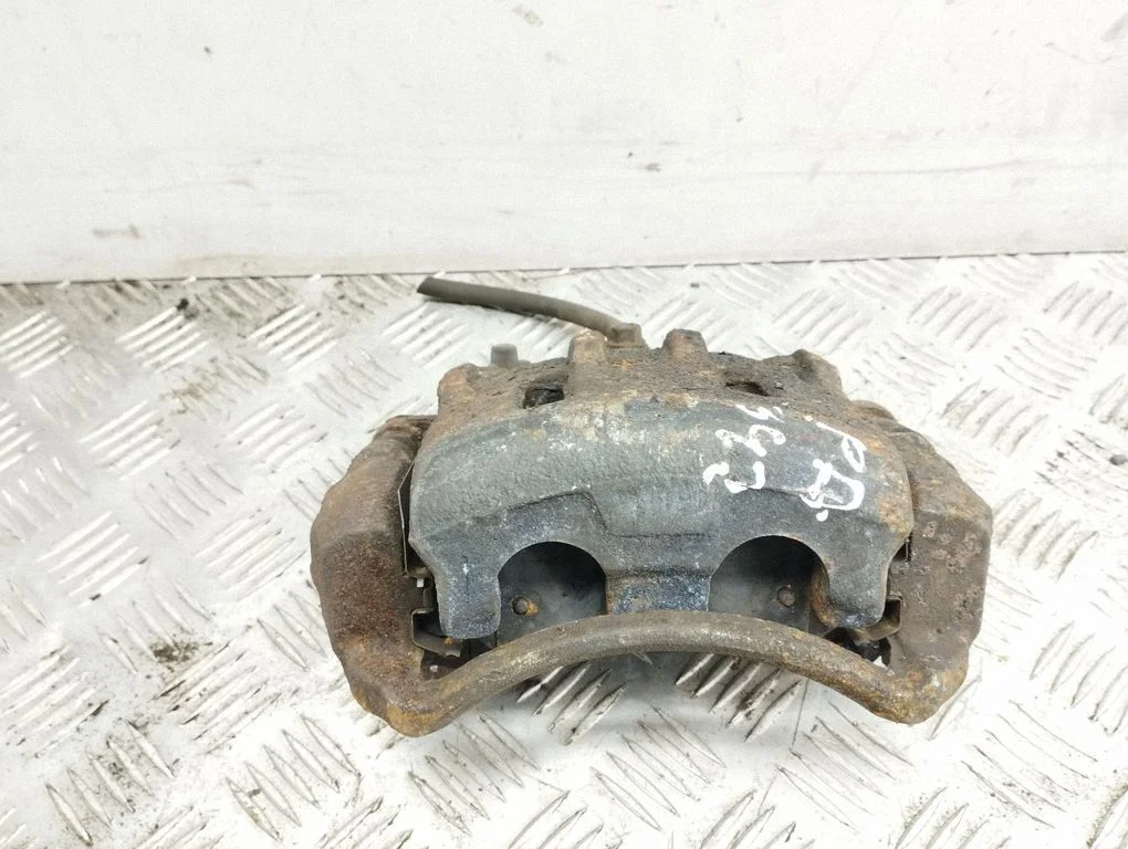 Front brake caliper – right