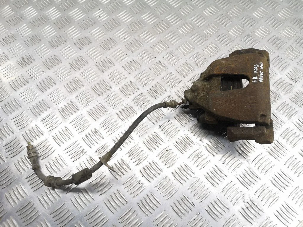 Front brake caliper – right