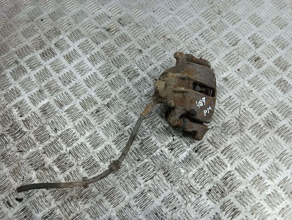 Front brake caliper – left